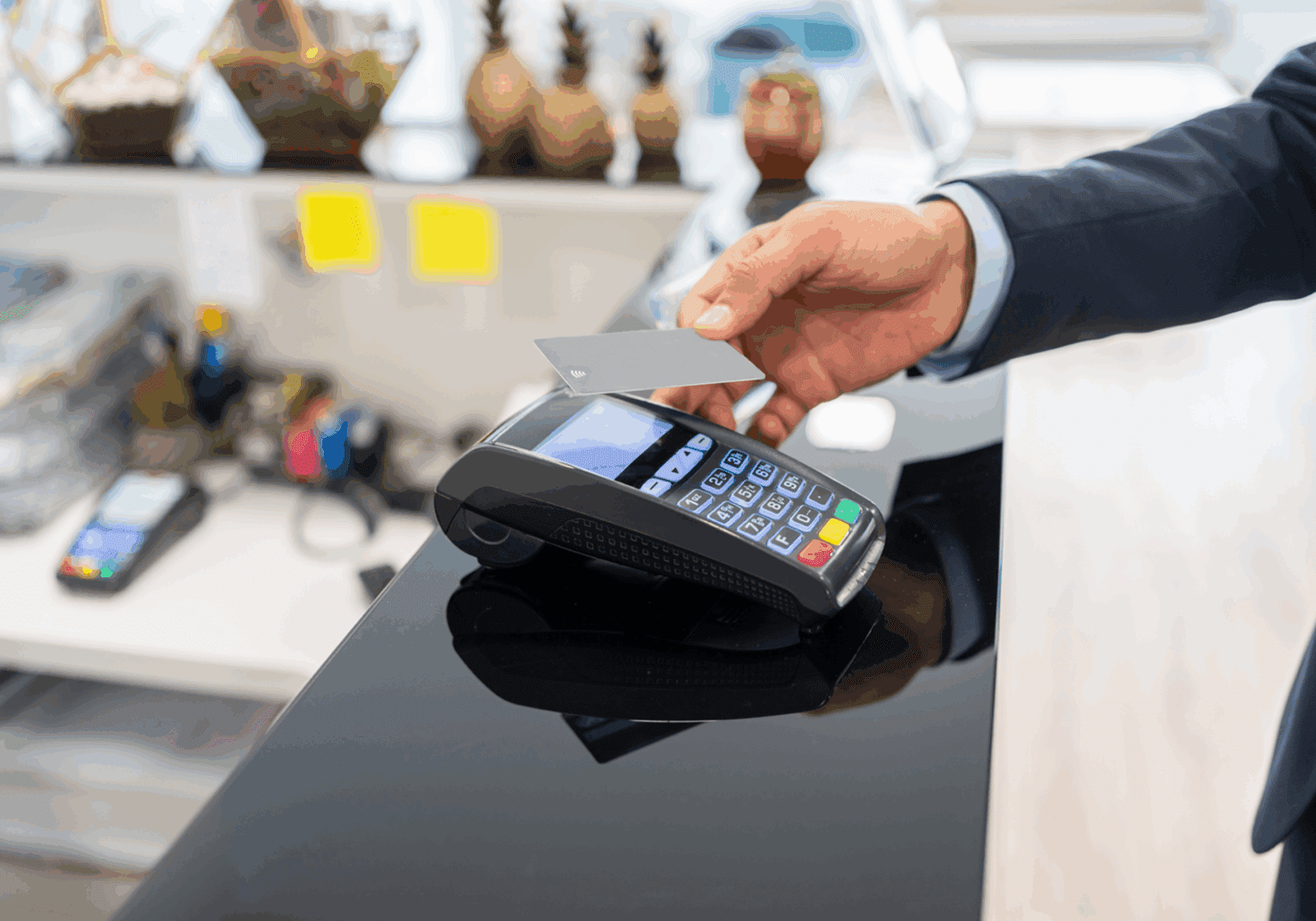 Contactless payment with card at terminal.